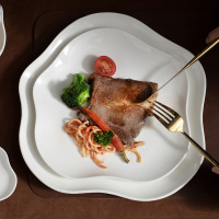 Simple white ceramic irregular soup plate 20221218